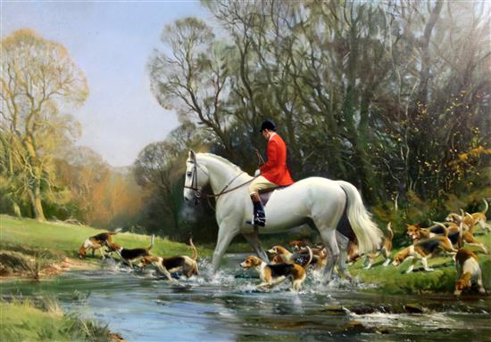 § Frank Wootton (1911-1996) Huntsman and hounds crossing a stream 28 x 40in.